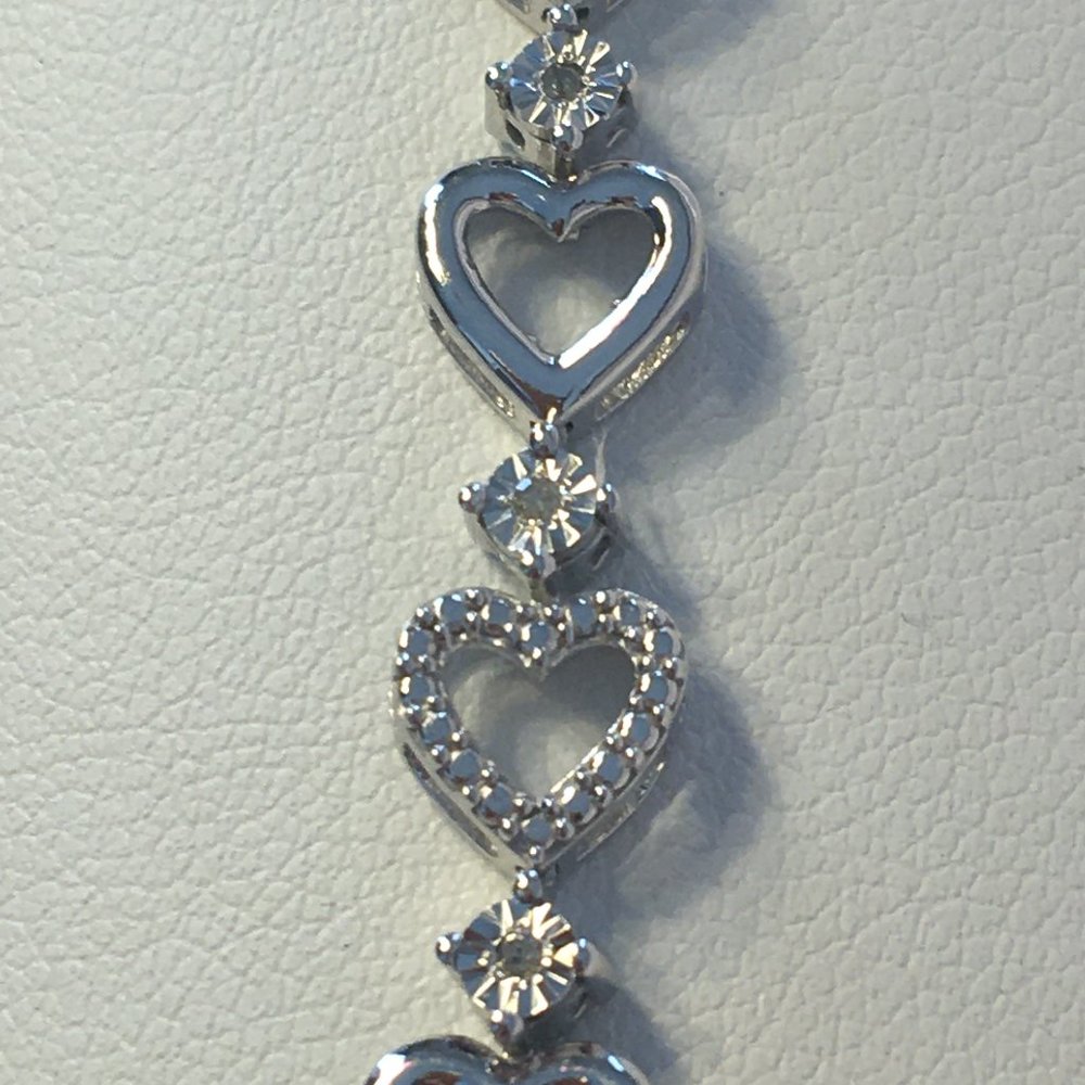 1/10 CT. T.W. White Diamond Heart Tennis Bracelet - Picture 4 of 9